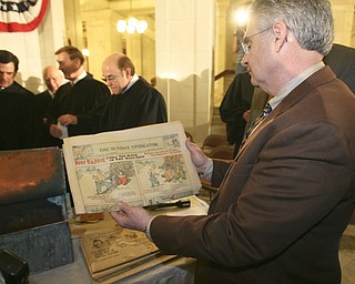 The observation that history repeats itself is illustrated by how events and circumstances have come full circle in the century since the Mahoning County Courthouse was built and opened..ÒWe owe a debt of gratitude and appreciation to the leaders, both in the public and private sectors, who, a century ago, demonstrated vision and resolve to complete this courthouse amid economic uncertainty,Ó said William Lawson, executive director of the Mahoning Valley Historical Society..Lawson was speaking at a Friday ceremony, during which hundreds of people gathered on all floors of the courthouse rotunda to mark the centennial of the March 6, 1911, opening of the building..