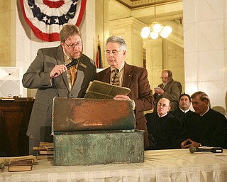 The observation that history repeats itself is illustrated by how events and circumstances have come full circle in the century since the Mahoning County Courthouse was built and opened..ÒWe owe a debt of gratitude and appreciation to the leaders, both in the public and private sectors, who, a century ago, demonstrated vision and resolve to complete this courthouse amid economic uncertainty,Ó said William Lawson, executive director of the Mahoning Valley Historical Society..Lawson was speaking at a Friday ceremony, during which hundreds of people gathered on all floors of the courthouse rotunda to mark the centennial of the March 6, 1911, opening of the building..
