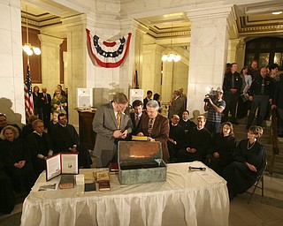 The observation that history repeats itself is illustrated by how events and circumstances have come full circle in the century since the Mahoning County Courthouse was built and opened..ÒWe owe a debt of gratitude and appreciation to the leaders, both in the public and private sectors, who, a century ago, demonstrated vision and resolve to complete this courthouse amid economic uncertainty,Ó said William Lawson, executive director of the Mahoning Valley Historical Society..Lawson was speaking at a Friday ceremony, during which hundreds of people gathered on all floors of the courthouse rotunda to mark the centennial of the March 6, 1911, opening of the building..