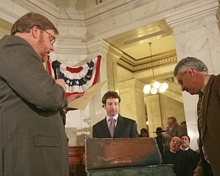 The observation that history repeats itself is illustrated by how events and circumstances have come full circle in the century since the Mahoning County Courthouse was built and opened..ÒWe owe a debt of gratitude and appreciation to the leaders, both in the public and private sectors, who, a century ago, demonstrated vision and resolve to complete this courthouse amid economic uncertainty,Ó said William Lawson, executive director of the Mahoning Valley Historical Society..Lawson was speaking at a Friday ceremony, during which hundreds of people gathered on all floors of the courthouse rotunda to mark the centennial of the March 6, 1911, opening of the building..