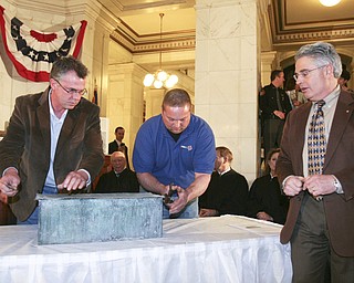 The observation that history repeats itself is illustrated by how events and circumstances have come full circle in the century since the Mahoning County Courthouse was built and opened..ÒWe owe a debt of gratitude and appreciation to the leaders, both in the public and private sectors, who, a century ago, demonstrated vision and resolve to complete this courthouse amid economic uncertainty,Ó said William Lawson, executive director of the Mahoning Valley Historical Society..Lawson was speaking at a Friday ceremony, during which hundreds of people gathered on all floors of the courthouse rotunda to mark the centennial of the March 6, 1911, opening of the building..