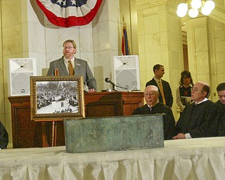 The observation that history repeats itself is illustrated by how events and circumstances have come full circle in the century since the Mahoning County Courthouse was built and opened..ÒWe owe a debt of gratitude and appreciation to the leaders, both in the public and private sectors, who, a century ago, demonstrated vision and resolve to complete this courthouse amid economic uncertainty,Ó said William Lawson, executive director of the Mahoning Valley Historical Society..Lawson was speaking at a Friday ceremony, during which hundreds of people gathered on all floors of the courthouse rotunda to mark the centennial of the March 6, 1911, opening of the building..