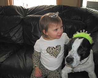 Isabella LaMont, 2, daughter of Ronda and Keith LaMont of Lowellville, plays princess dress-up with her dog Gotti. Photo submitted by Cindy Perry of Lowellville.