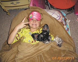 Dhani Romack and her best friend, Bella, get ready to take a nap. They're both from Youngstown.