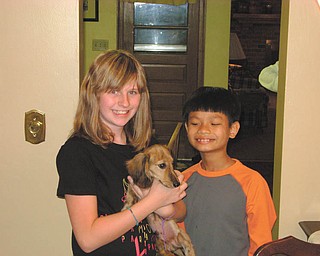 Hailing from Poland are buddies Hannah Lavelle, left, Minhy Man and Christian Compton.