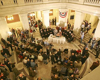 The observation that history repeats itself is illustrated by how events and circumstances have come full circle in the century since the Mahoning County Courthouse was built and opened..ÒWe owe a debt of gratitude and appreciation to the leaders, both in the public and private sectors, who, a century ago, demonstrated vision and resolve to complete this courthouse amid economic uncertainty,Ó said William Lawson, executive director of the Mahoning Valley Historical Society..Lawson was speaking at a Friday ceremony, during which hundreds of people gathered on all floors of the courthouse rotunda to mark the centennial of the March 6, 1911, opening of the building..