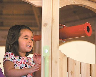 Giuliana Ricchiuti, 4, gets an eyeful at Skedaddles Indoor Playground on Market Street. Giuliana inspired her mom, Dini Ricchiuti, to open Skedaddles.