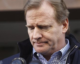 NFL Commissioner Roger Goodell pauses while speaking with the media after football labor negotiations, Friday, March 4, 2011, in Washington. (AP Photo/Alex Brandon)