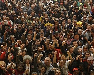 Protesters fill the rotunda at the Ohio Statehouse following Ohio Gov. John Kasich's State of the State address Tuesday, March 8, 2011, in Columbus, Ohio.