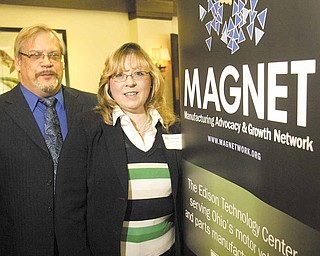 Jim Courim, left, training coordinator at Severstal Warren, and Becky Kemp, a consultant with the Manufacturing Advocacy and Growth Network, spoke Wednesday at the Trumbull Country Club during a Youngstown/Warren Regional Chamber event. Kemp will operate MAGNET’s new office, which opened in the Chamber’s Warren location. Kemp cited the organization’s work with Severstal Warren as an example of MAGNET’s plans for assisting companies in the Mahoning Valley.