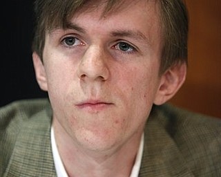 In a Wednesday, Oct. 21, 2009, file photo, James O'Keefe attends a news conference at the National Press Club in Washington. A National Public Radio executive blasts the tea party movement as "racist" and "xenophobic" and says NPR would be better off without federal funding in a hidden-camera video released Tuesday, March 8, 2011, by O'Keefe.