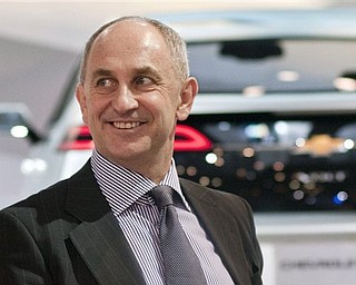 In this March 13, 2010 photo provided by General Motors Co. (then) Vice Chariman and CFO Chris Liddell attends the New York International Auto Show in New York. General Motors Co. said Thursday, March 10, 2011, Liddell will step down as of April 1.
