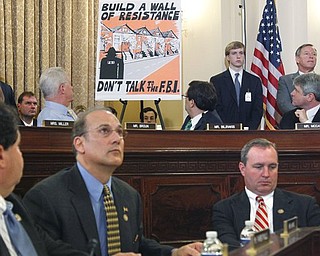 Members of the House Homeland Security Committee listen to testimony during a hearing on the extent of the radicalization of American Muslims, on Capitol Hill in Washington, Thursday, March 10, 2011.