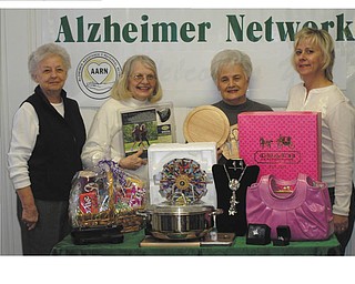 Remembering others: The Alzheimer’s Assistance and Referral Network will sponsor its annual charity auction, titled “Valley Memories,” on March 26 at the Fifth Season Banquet Center, 1400 N. Canfield Niles Road, Mineral Ridge, where doors will open at 6 p.m. Items for basket, silent and live auctions have been donated by area residents and businesses. Take II will entertain. For tickets ($42.50), call the network at 330-788-9755. Proceeds help to fund the network’s caregiver education series, research program, family support groups, telephone information line and public awareness events. Above, from left to right, are Dorothy Leone, Dorothy Barto, Carmela Guy and Mary Kay Kollat.