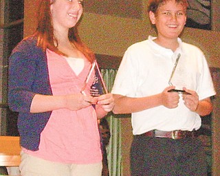 Madeline Graziano and Andrew Brockway, both seventh-grade students at Holy Family School in Poland, achieved the top honors at the school’s 2011 science fair.