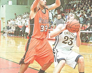 Nick Rota (23) and the Division IV McDonald Blue Devils will have the opportunity tonight to attain something that their extremely successful basketball program has yet to achieve when they face Richmond Heights at Canton Fieldhouse: a regional victory.