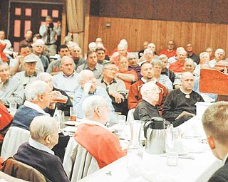 Ohio State coach Jim Tressel speaks at a luncheon sponsored by the Pro Football Hall of Fame Monday, March 14, 2011, in Canton, Ohio. Tressel apologized to a room full of fans during his first public speaking engagement since being suspended two games and fined for violating NCAA rules.