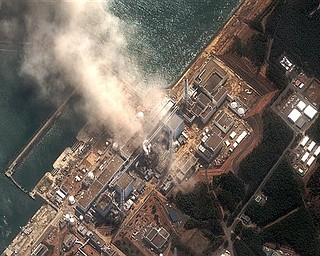 This satellite image provided by DigitalGlobe shows the damaged Fukushima Dai-ichi nuclear facility in Japan on Monday, March 14, 2011. Authorities are strugging to prevent the catastrophic release of radiation in the area devastated by a tsunami.