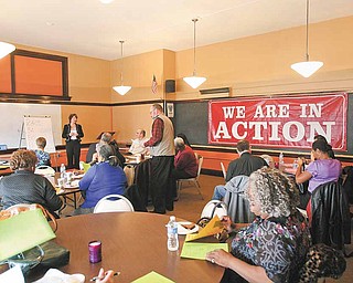 Members of ACTION clergy caucus listen to Lori O’Neill of Gun Sensus as she talks about the gun show loop hole. The Alliance for Congregational Transformation Influencing Our Neighborhoods is a faith-based regional organization of leaders and congregations in the Mahoning Valley who work together against injustice in the community.