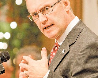Ohio State coach Jim Tressel speaks at a luncheon sponsored by the Pro Football Hall of Fame Monday, March 14, 2011, in Canton, Ohio. Tressel apologized to a room full of fans during his first public speaking engagement since being suspended two games and fined for violating NCAA rules. (AP Photo)