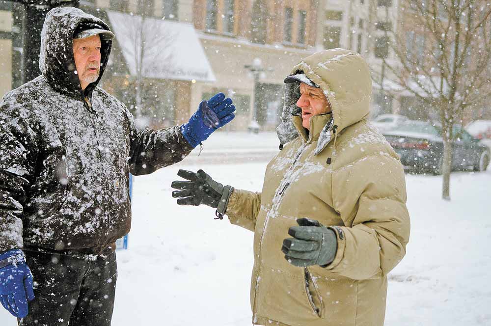 Even on this morning of Feb 25, 2011, George Prvonozac of Warren and Dan Spithaler of Howland walk through a snow storm and continue their prayers.