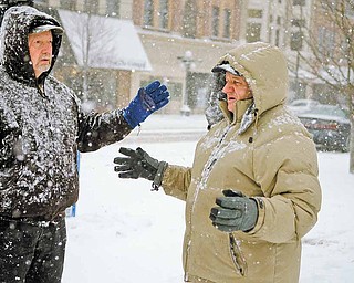 Even on this morning of Feb 25, 2011, George Prvonozac of Warren and Dan Spithaler of Howland walk through a snow storm and continue their prayers.