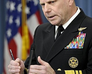Navy Vice Adm. Bill Gortney, director of the Joint Staff, gives an operational update concerning Libya, at the Pentagon in Washington, Sunday, March 20, 2011.
