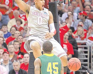 Ohio State Buckeyes forward Jared Sullinger (0) dunks on the George Mason Patriots during the third round of the men's NCAA basketball tournament at the Quicken Loans Arena in Cleveland, Ohio, Sunday, March 20, 2011. The Ohio State Buckeyes defeated the George Mason Patriots, 98-66.