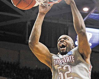 Ohio State's Dallas Lauderdale dunks against George Mason in the first half of an East regional NCAA college basketball tournament third-round game Sunday, March 20, 2011, in Cleveland.