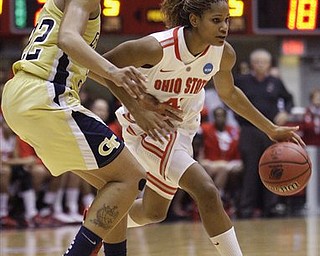 Ohio State's Brittany Johnson, right, drives to the basket against Georgia Tech's Alex Montgomery during the first half of a second-round NCAA women's college basketball tournament game Monday, March 21, 2011, in Columbus, Ohio.