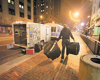Red Wanting Blue members load up their gear after a show in a scene from the fi lm “These Magnifi cent Miles.”