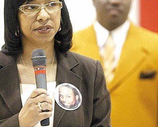Shirlene Hill, Johnson’s mother, spoke to the students about remembering to help others, just like her son. In the background is her husband, Sidney Hill.