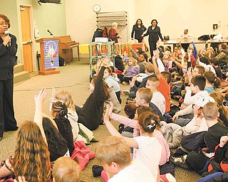 Loreatha V. Hawkins of Campbell talks to third- and fourth-graders from E.J. Blott Elementary School in Liberty, about following their dreams. That’s a message in her fairy tale, “The Prince and the Musical Castle.” 