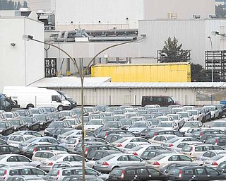 In this Oct. 1, 2003 file photo, a general view of the Ford Motor Company plant in Genk, Belgium, is seen. Ford Motor Co. said Saturday, March 26, 2011, it will idle their plant in Genk for five days, trying to conserve supplies of Japanese parts that could run low following an earthquake and tsunami. Ford spokesman Todd Nissen said the plant will close beginning April 4. The company had planned to idle the plant in May for another reason. But it moved up the date after auto parts suppliers in Japan were damaged by the twin disaster on March 11.