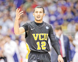 Virginia Commonwealth's Joey Rodriguez reacts during the second half at the Southwest regional final game in the NCAA college basketball tournament Sunday, March 27, 2011, in San Antonio.
