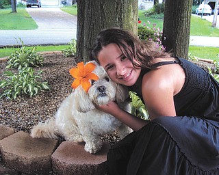 Jessica Dworak of New Middletown submitted this photo of her daughter, Melissa Iamurri, and their family pet, Bandit. She said they can't wait to get out of the house to enjoy the fresh air this spring.