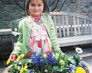 Morgan Rolley of Austintown enjoys some lovely flowers at Fellows Riverside Gardens. She visited in 2010 at Easter. Photo sent in by Barb Rolley.