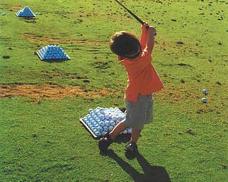Dennis Vitt of Poland sent this picture of his grandson, Ty Blythe, who, at only 2 1/2, has the form of a pro golfer. You can be sure he'll be back out on the links come warm weather. He is the son of James and Christa (Vitt) Blythe of Dublin, Ohio.