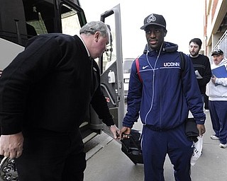 Connecticut's Kemba Walker boards a bus on campus bound for the airport in Storrs, Conn., en route to Houston, Wednesday, March 30, 2011. Connecticut will face Kentucky in NCAA Final Four Game in Houston Saturday.