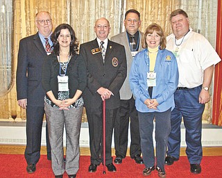 Rotarians from six area clubs traveled to Columbus for the All-Ohio Rotary Presidents-Elect Training Seminar recently. From left to right are Michael Raulin of Canfield Rotary; Deanna Spirko of Austintown Rotary; George Hayes, Rotary District 6650 governor-elect; Steve Zentko of Poland Rotary; Suzanne Fleming of Youngstown Rotary; and Michael Evanson of Struthers Rotary. Virginia Amstutz of Boardman Rotary is not pictured.