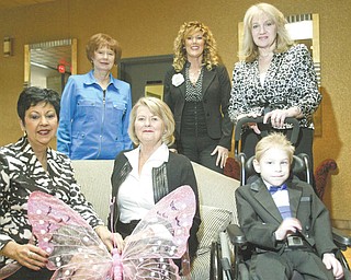 William D. Lewis | The Vindicator: Involved in planning the ”Butterflies and Blossoms” fashion show and luncheon to be presented by Angels of Easter Seals are, in front from left, Judy Conti, fashion coordinator and narrator; Caren Dalton, co-chairwoman; and Cody Denmeade, 5, Easter Seals 2011 child representative; and in back, Geri Kosar, Bethann Zoldan and Sharon Musilli, co-chairwomen.