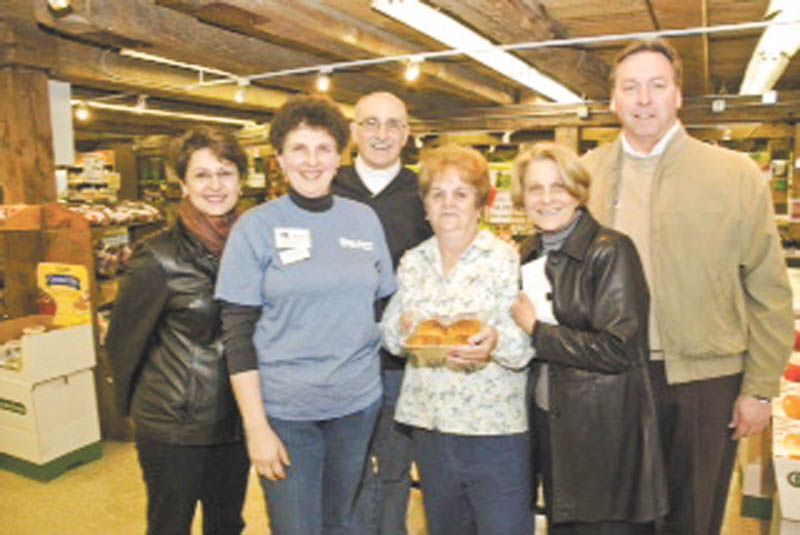 Pleased with the outcome of the Apple Dessert Recipe Contest on March 26 at White House Fruit Farm are, from left, Suzanne Barbati, a judge; Debbie Pifer, owner of White House Fruit Farm; Mike Iberis, a judge; Juanita Taylor, one of the contest winners; and Regina Reynolds and Glenn Stevens, judges.
