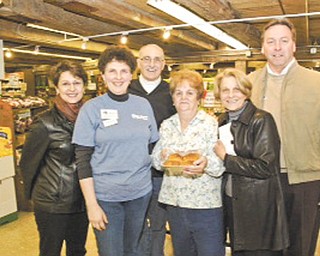 Pleased with the outcome of the Apple Dessert Recipe Contest on March 26 at White House Fruit Farm are, from left, Suzanne Barbati, a judge; Debbie Pifer, owner of White House Fruit Farm; Mike Iberis, a judge; Juanita Taylor, one of the contest winners; and Regina Reynolds and Glenn Stevens, judges.