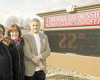 A new energy-efficient and computer-operated sign recently was installed at Liberty Township Administration Building, 1315 Church Hill-Hubbard Road. Standing by the new sign, from left, are June Smallwood, director of parks and special projects; Jodi Stoyak, trustee; and Pat Ungaro, township administrator. The sign was funded by a grant from Northeast Ohio Public Energy Council. Smallwood wrote the grant.