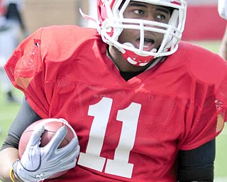 Youngstown State’s Kevin Watts runs back a kick during Saturday’s scrimmage at YSU’s Stambaugh Stadium.
