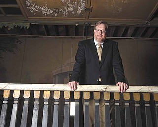 The Mahoning Valley Historical Society has done more recently to attract people in their 20s and 30s, says Bill Lawson, executive director, right. With him is Paul Hagman, 28, a MVHS member for about five years and Young Leaders Advisory Board chairman.