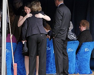 Family and friends gather outside a church cemetery for Summer Inman's graveside service, Monday, April 4, 2011, in Logan, Ohio. Inman was found in a church's septic system with a zip tie pulled tightly around her neck. Her estranged husband and his parents have been charged with kidnapping.