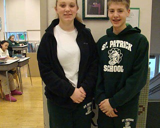 The Hubbard Optimist Club had its 57th annual oratorical contest recently, featuring the topic “If I were the leader of the world the first issue I would address would be. ...” Students wrote essays to finish the sentence. Above are two of the winners. Gabriella Hosack took first place among girls in eighth grade at St. Patrick School in Hubbard with her essay focusing on medical issues. Justin Oaks took first place among boys for his essay focusing on poverty issues. The two students will advance to regional competition in Springfield, Ohio.