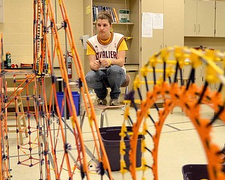 Jackson Milton High School students have had to apply physics properties to improve their roller coaster made out of K’NEX for a nationwide competition. Senior Bethany Sitler said the process has involved trial and error.