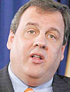 In this March 3, 2011 photograph, New Jersey Gov. Chris Christie answers a question in Trenton, N.J.  Christie likes to use numbers, a lot of them, to explain to people the enormity of the state's fiscal crisis. But like with many things, context can change the meaning. 
